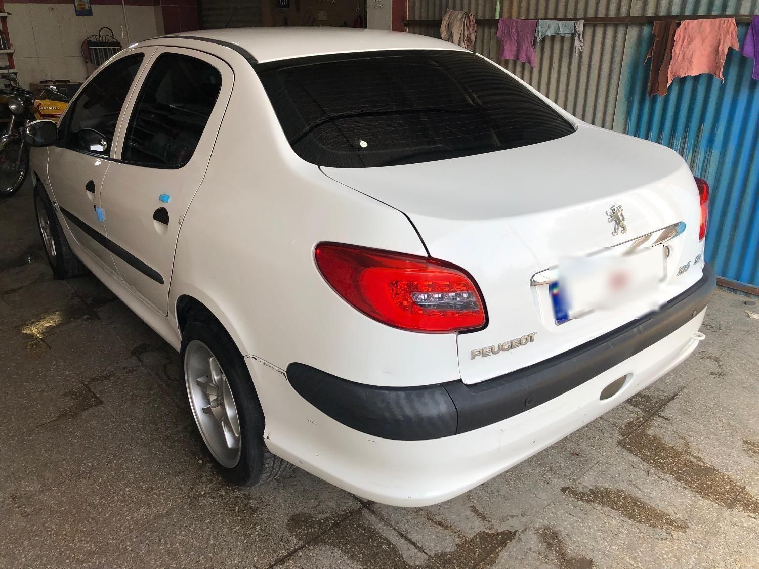 پژو ۲۰۶ صندوق دار v8 - 1394