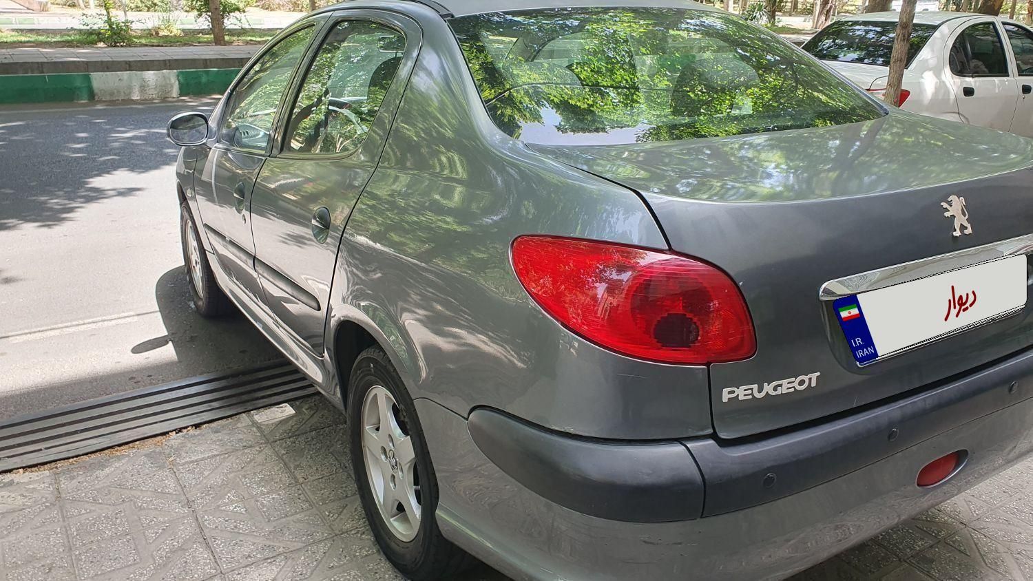 پژو ۲۰۶ صندوق دار v8 - 1390