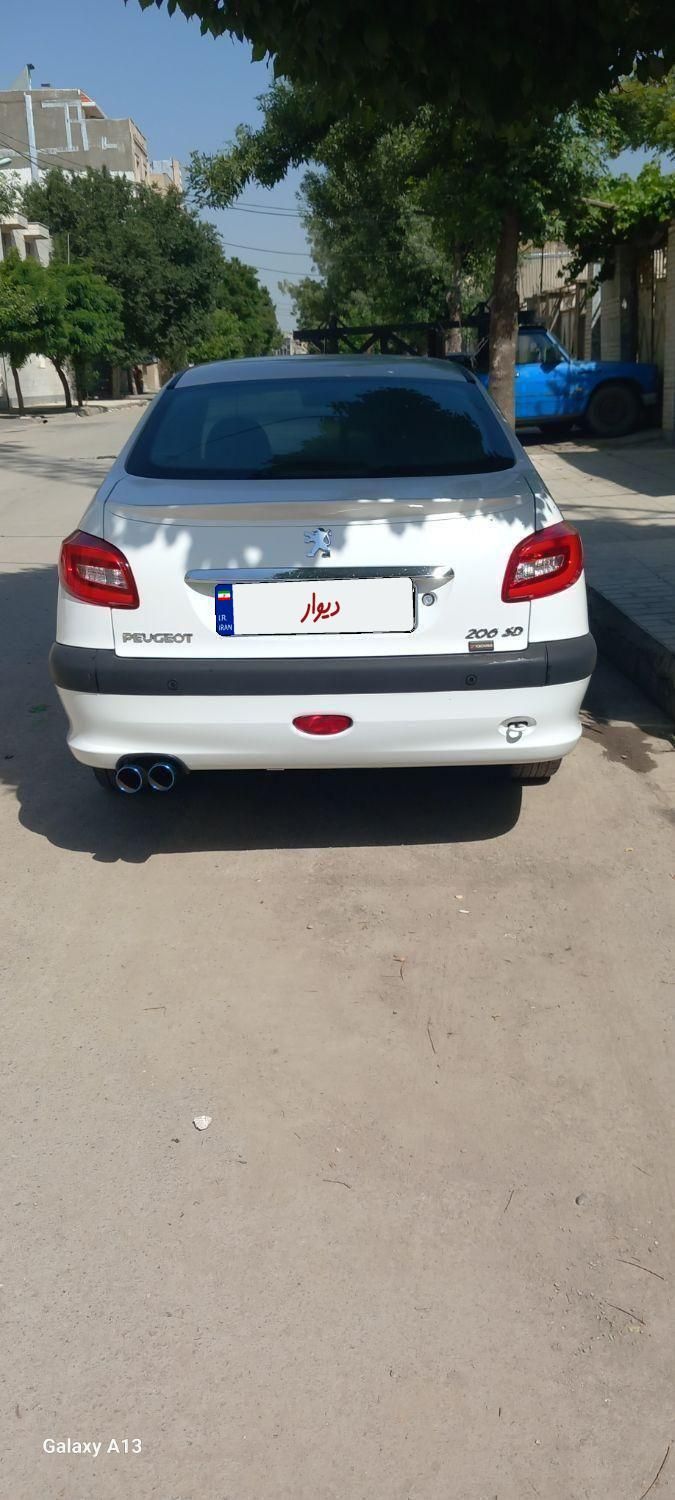 پژو ۲۰۶ صندوق دار v8 - 1395