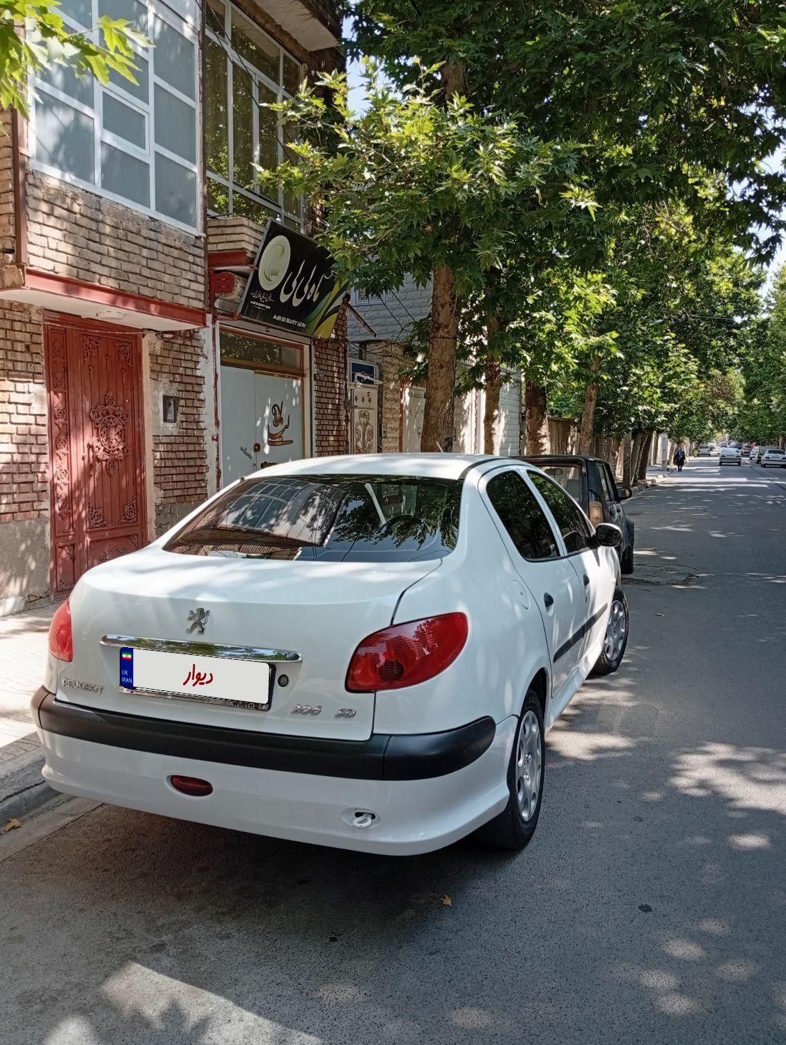 پژو ۲۰۶ صندوق دار v8 - 1395