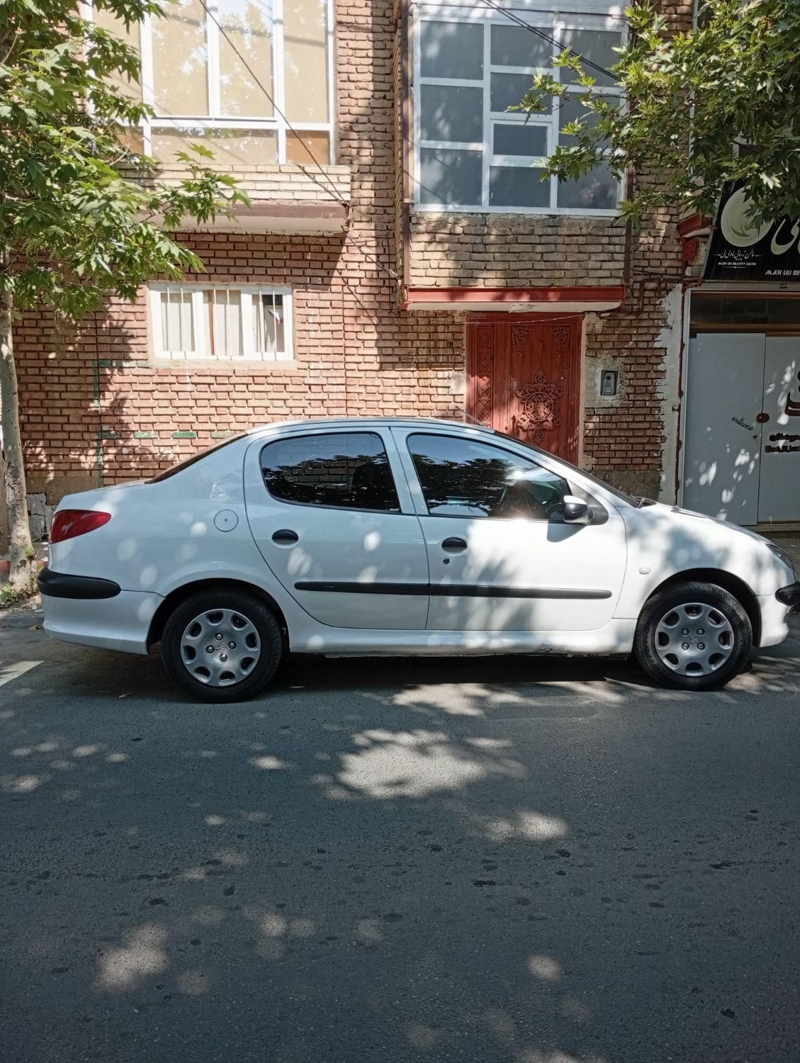 پژو ۲۰۶ صندوق دار v8 - 1395