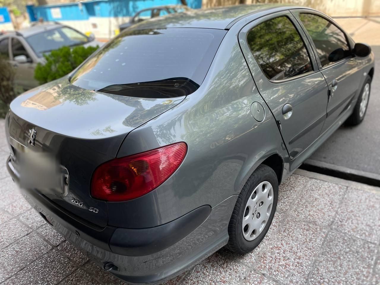 پژو ۲۰۶ صندوق دار v8 - 1396