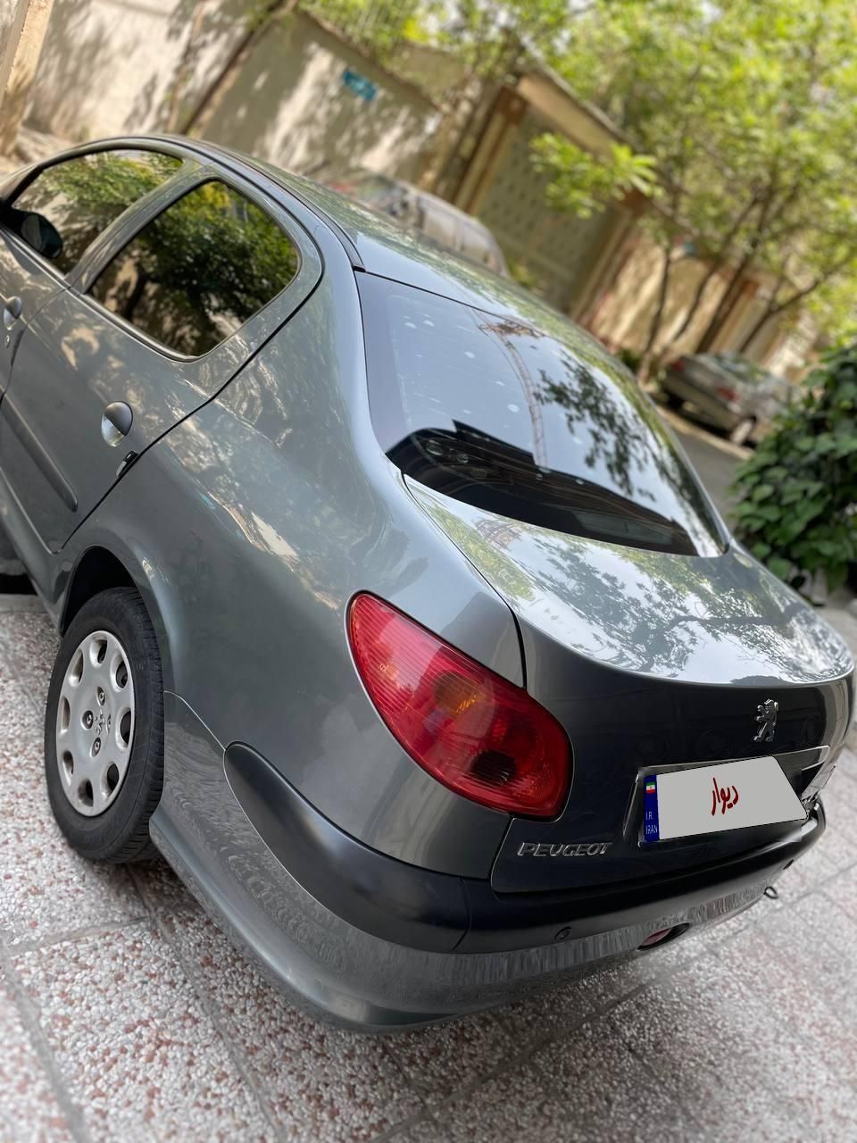 پژو ۲۰۶ صندوق دار v8 - 1396
