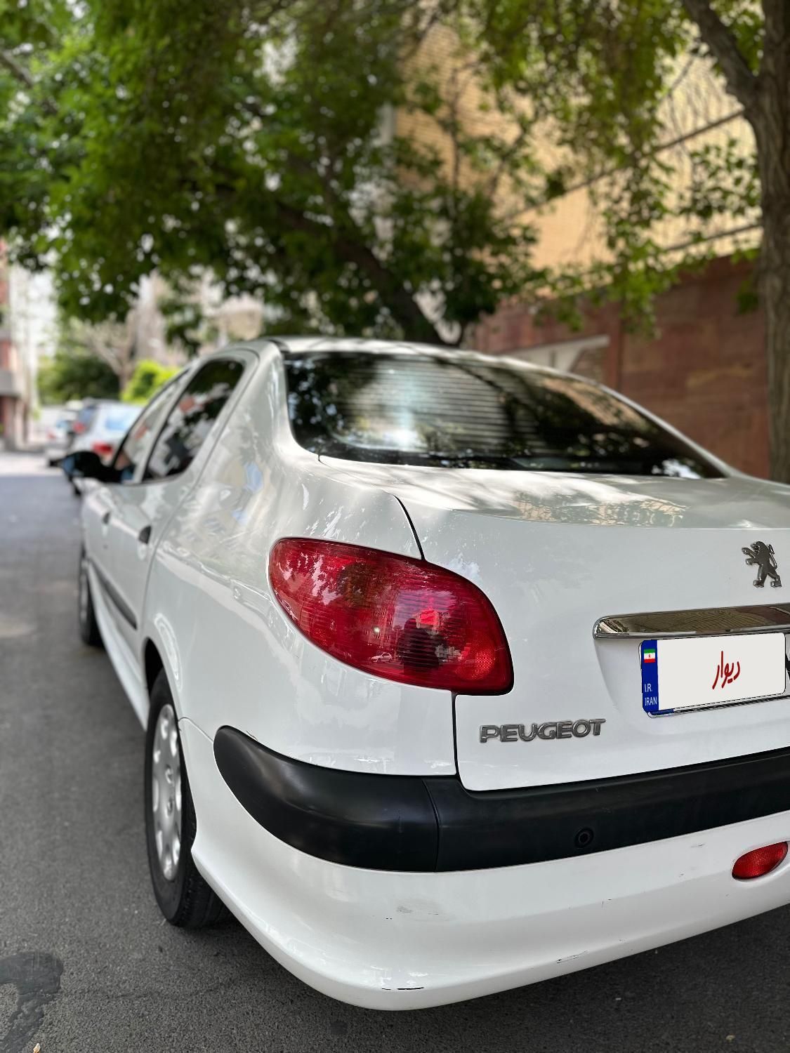پژو ۲۰۶ صندوق دار v8 - 1396