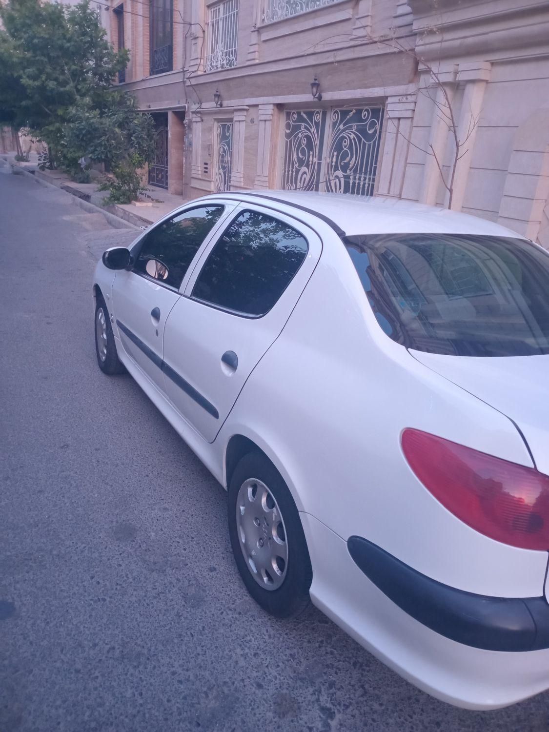 پژو ۲۰۶ صندوق دار v8 - 1396