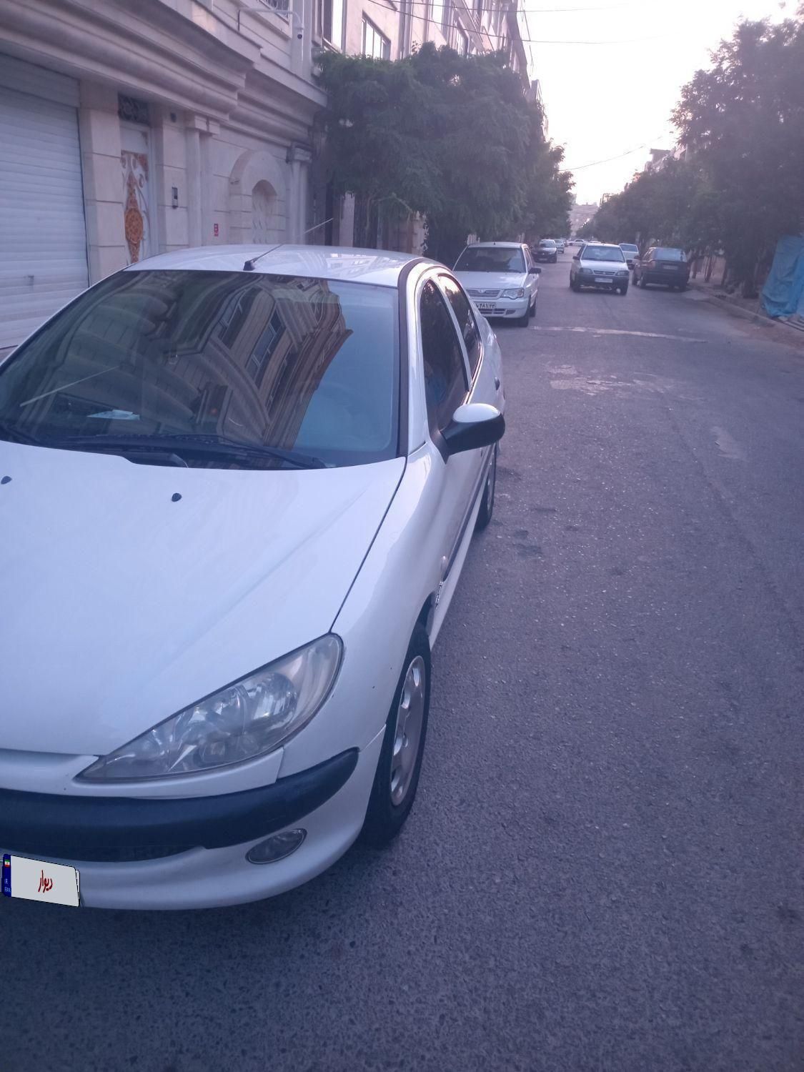 پژو ۲۰۶ صندوق دار v8 - 1396