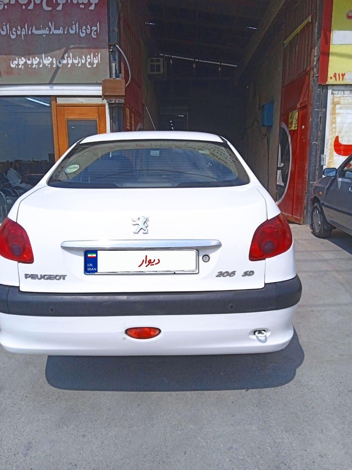 پژو ۲۰۶ صندوق دار v8 - 1396