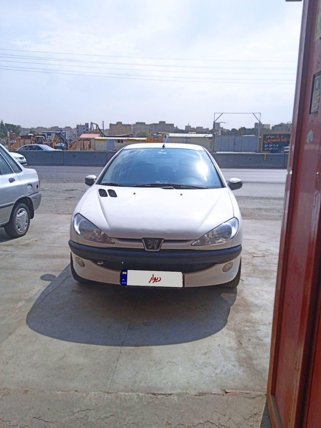 پژو ۲۰۶ صندوق دار v8 - 1396