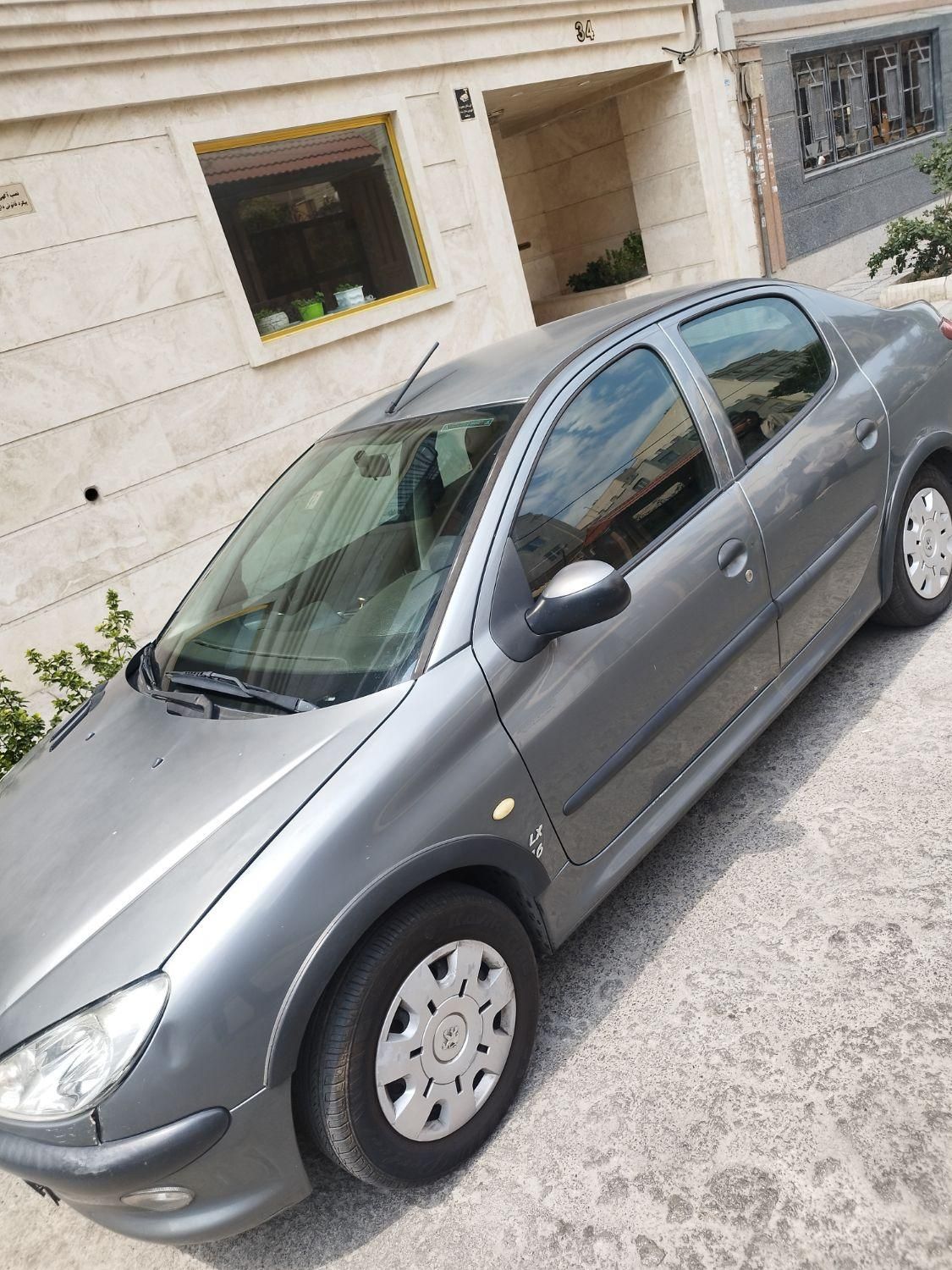پژو ۲۰۶ صندوق دار v8 - 1393