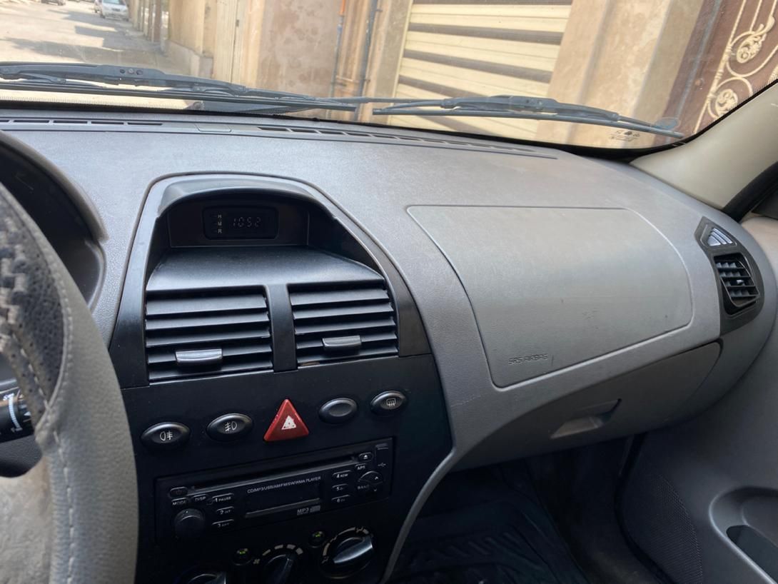 تیبا صندوق دار SX - 1396