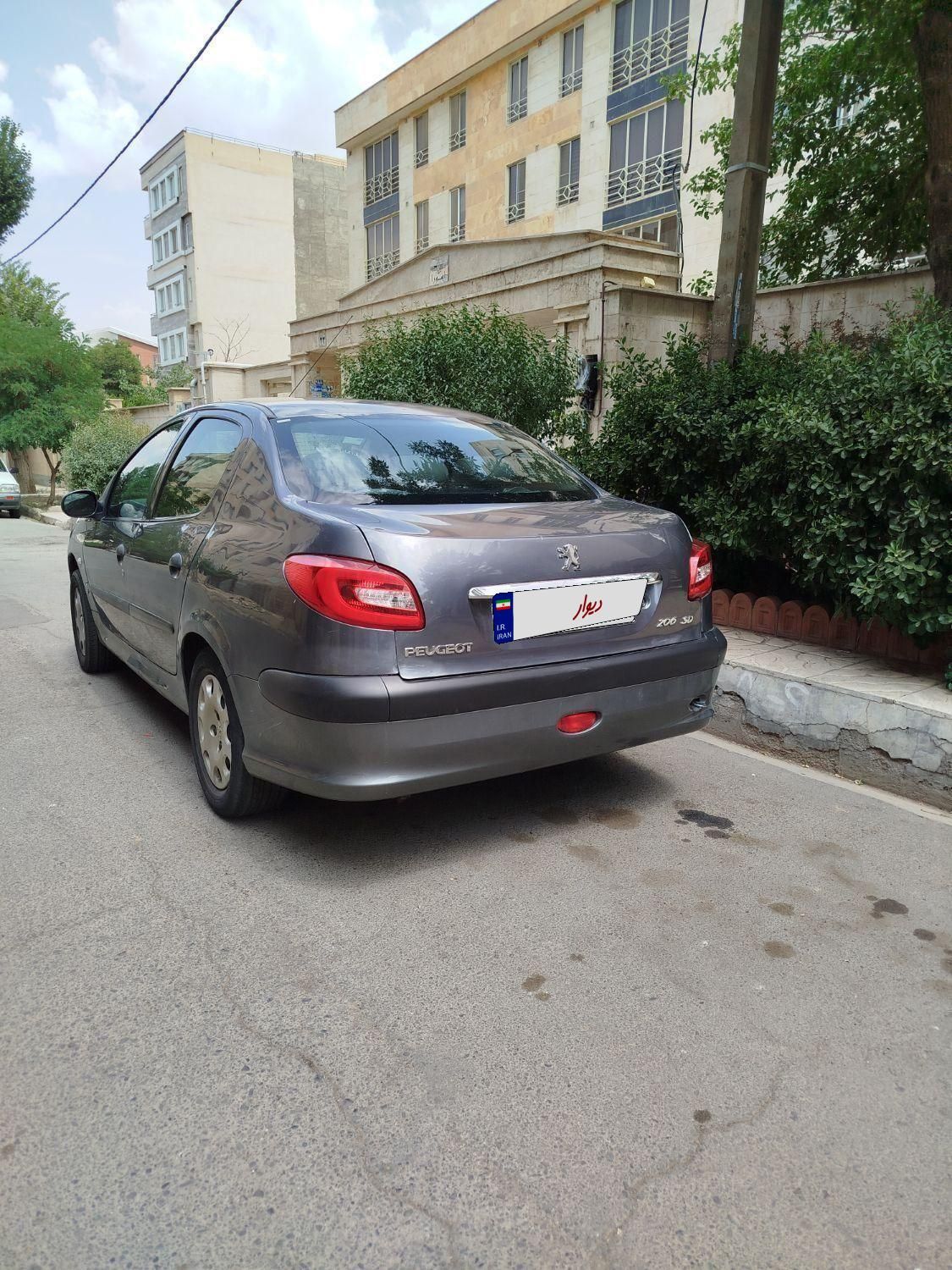 پژو ۲۰۶ صندوق دار v8 - 1391