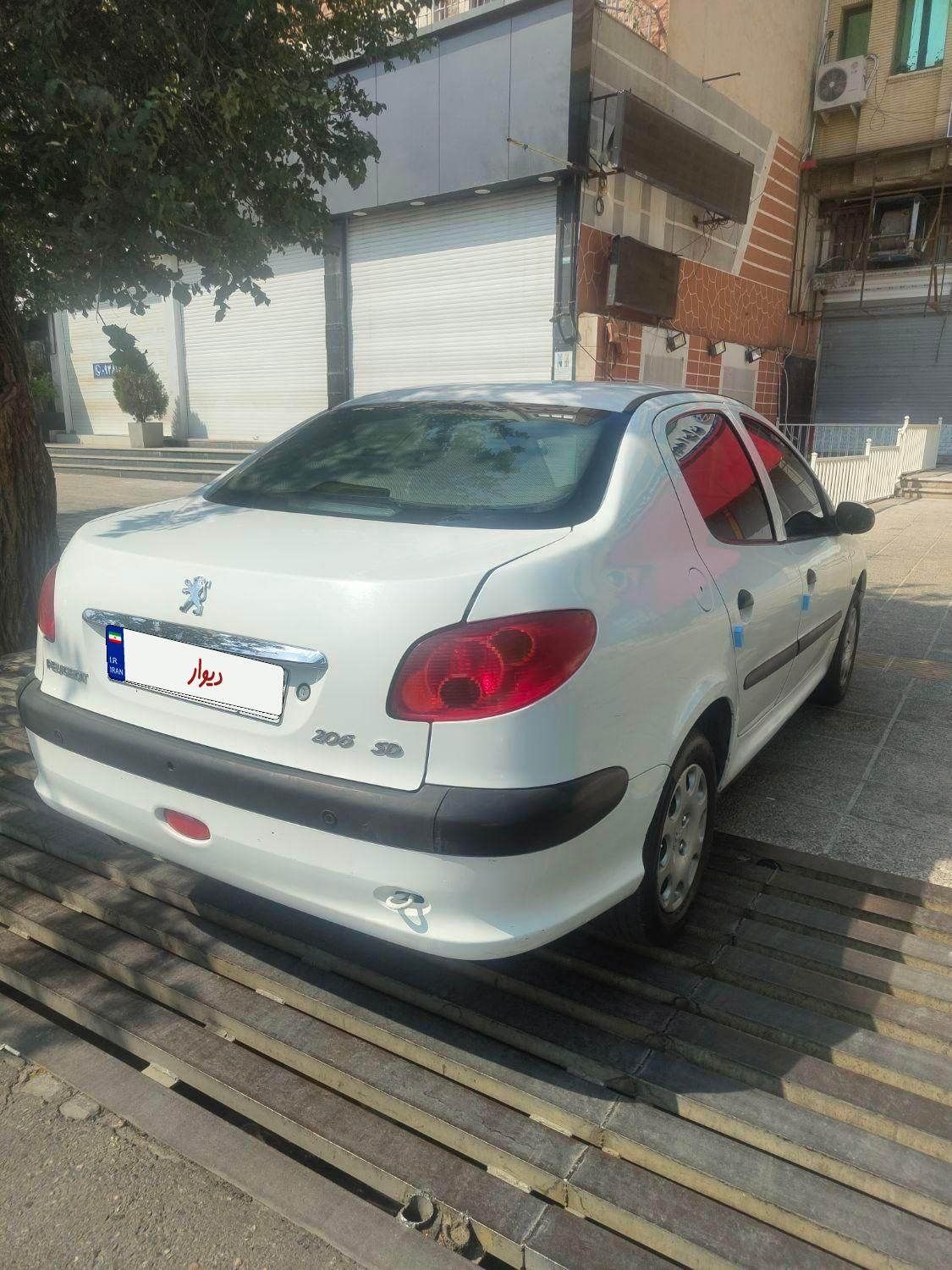 پژو ۲۰۶ صندوق دار v8 - 1395