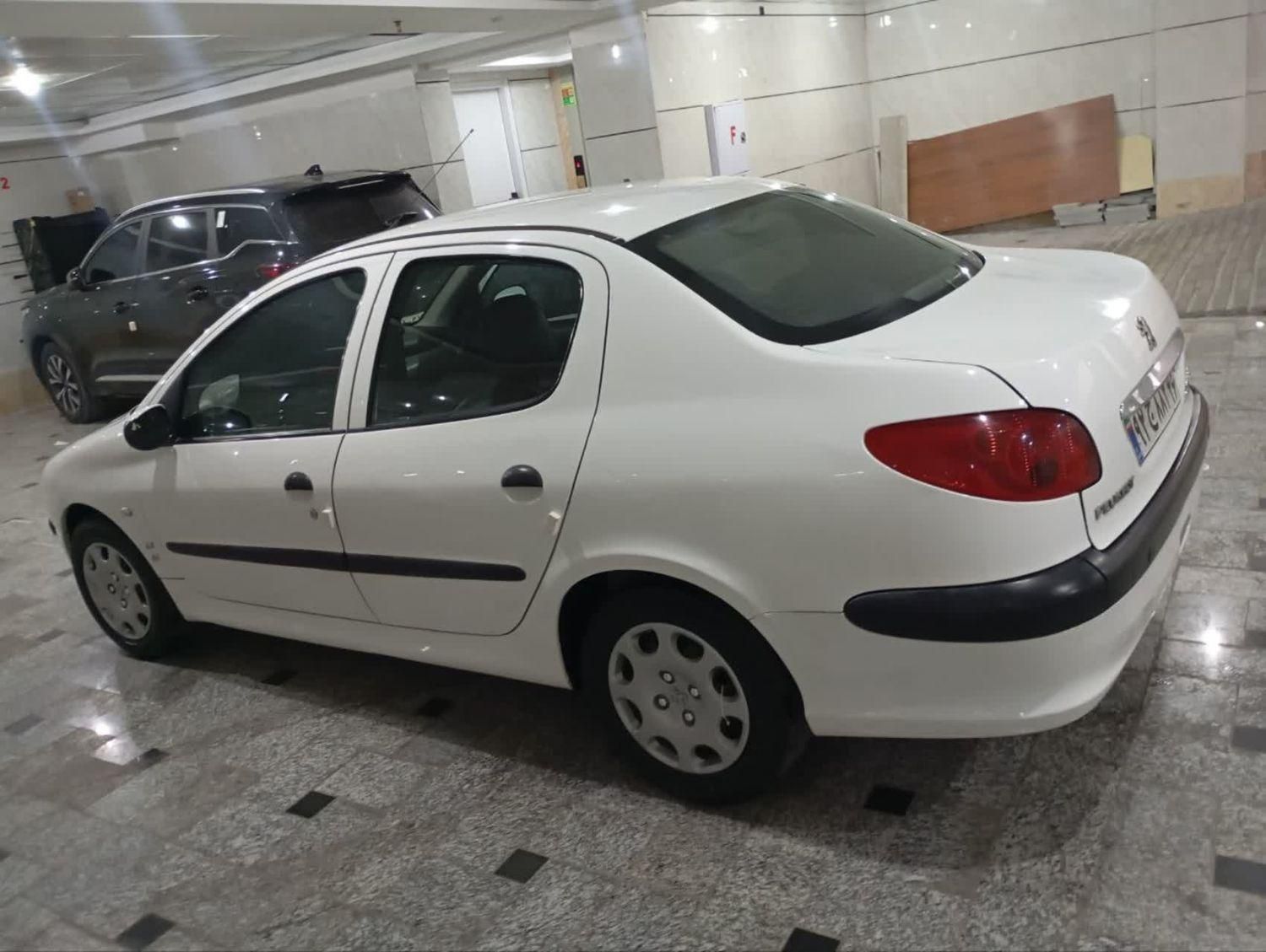 پژو ۲۰۶ صندوق دار v8 - 1394