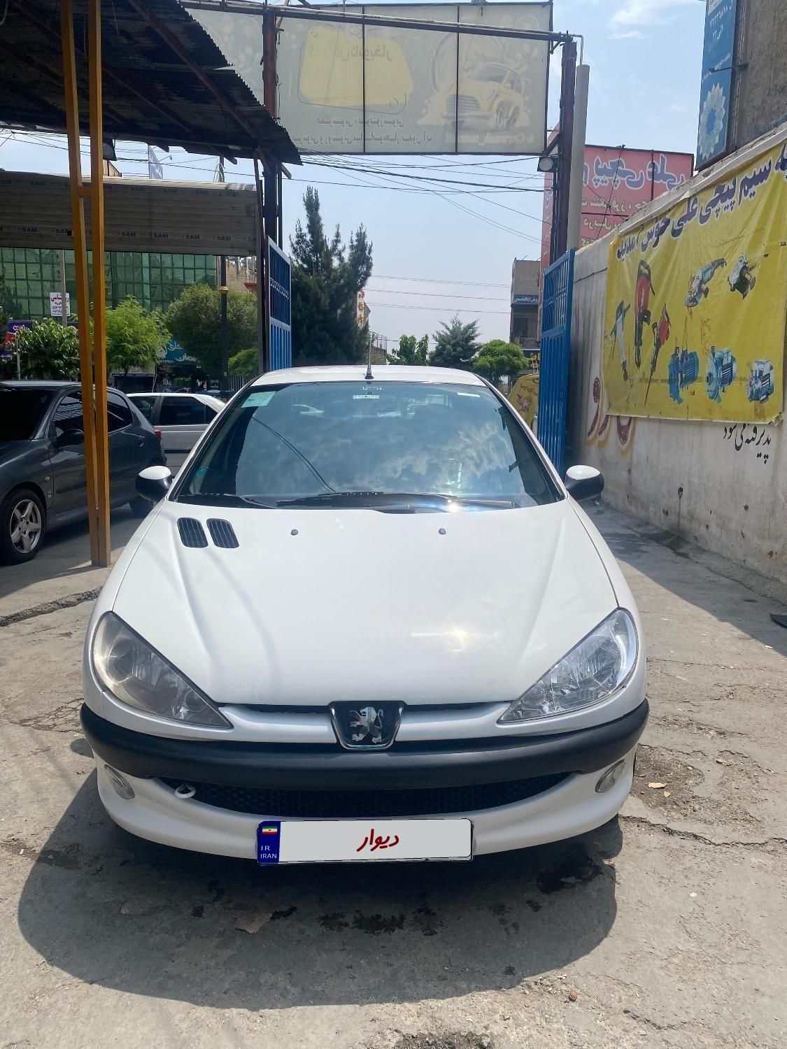 پژو ۲۰۶ صندوق دار v8 - 1396