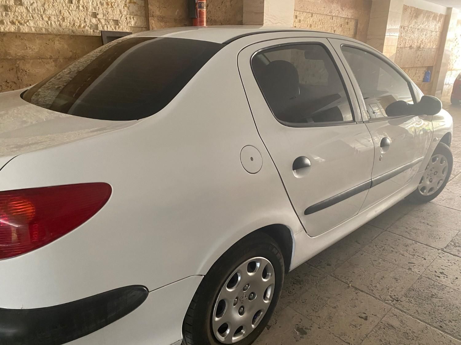 پژو ۲۰۶ صندوق دار v8 - 1394