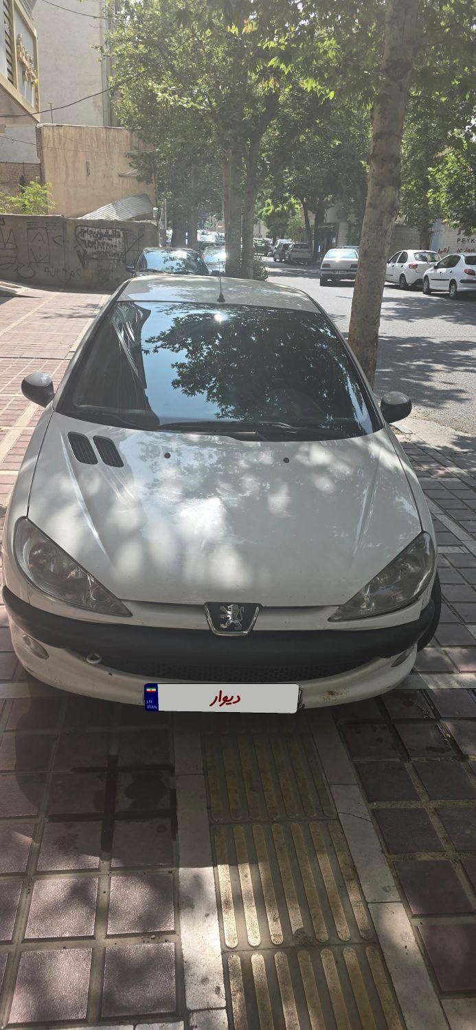 پژو ۲۰۶ صندوق دار v8 - 1396