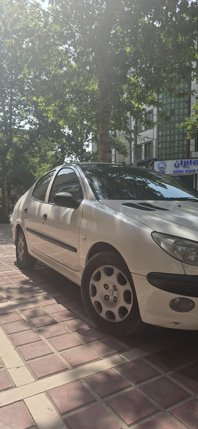 پژو ۲۰۶ صندوق دار v8 - 1396