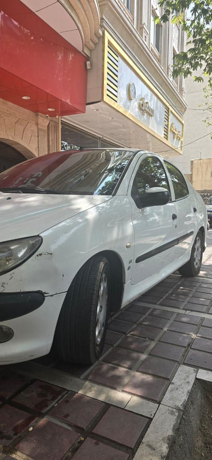 پژو ۲۰۶ صندوق دار v8 - 1396