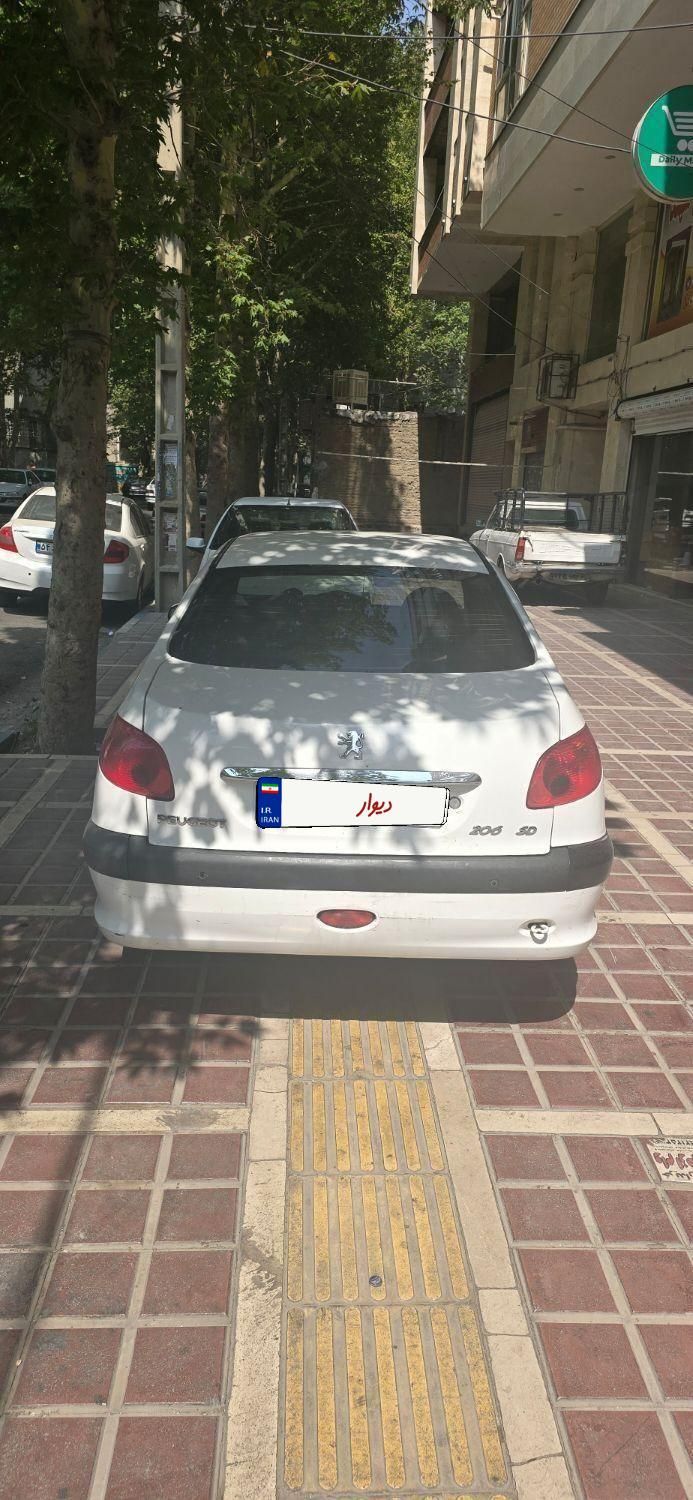 پژو ۲۰۶ صندوق دار v8 - 1396