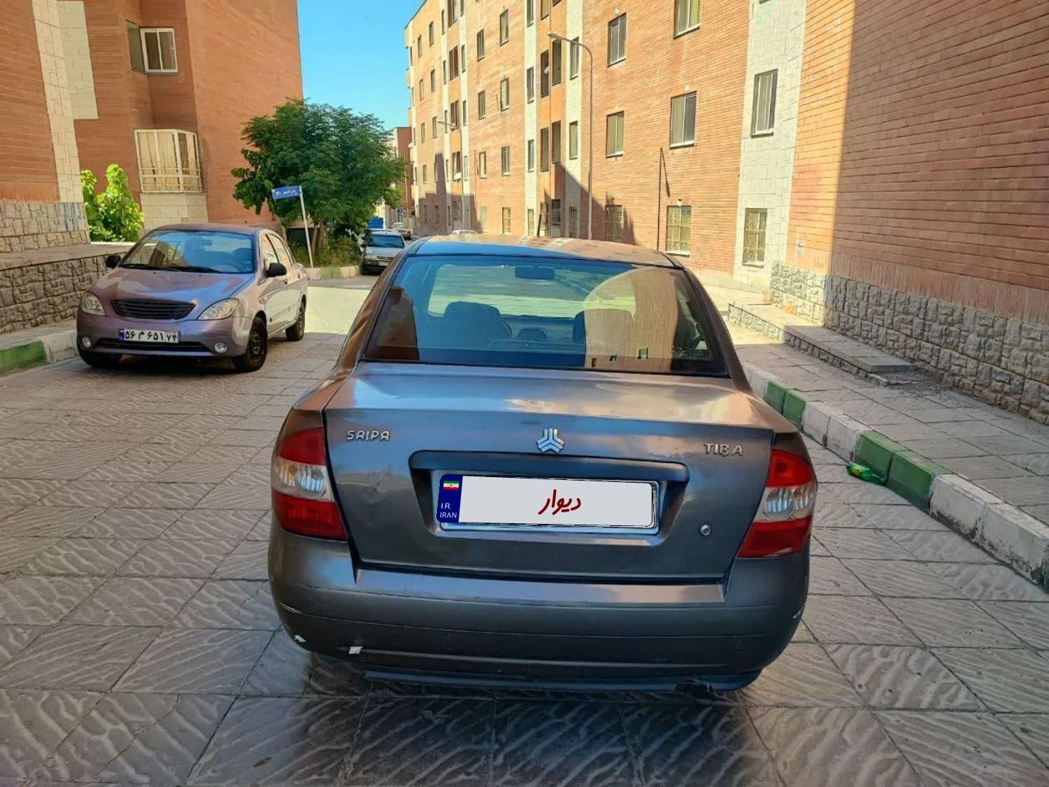 تیبا صندوق دار SX - 1393