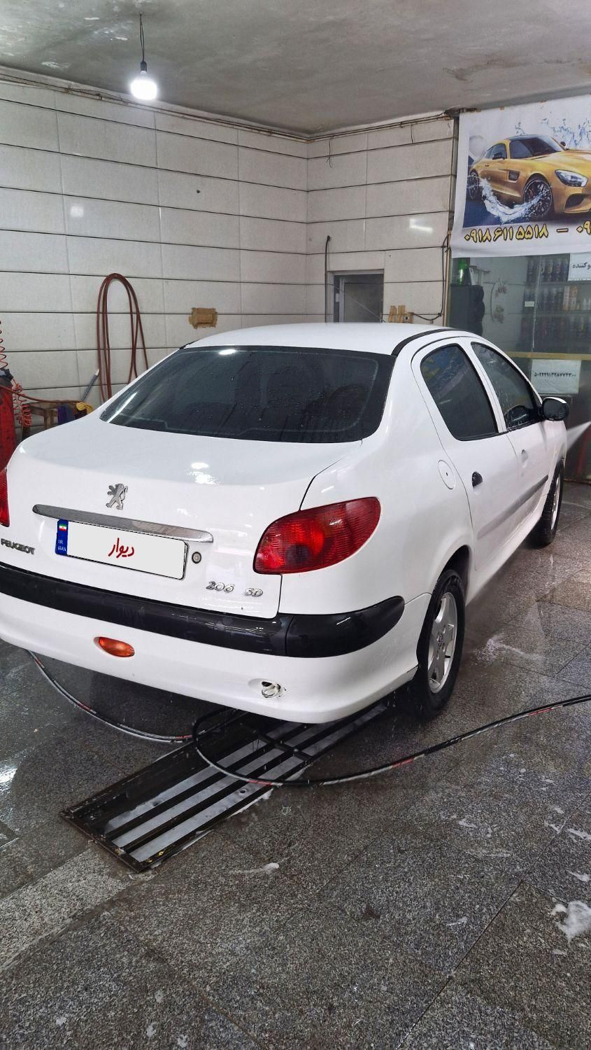 پژو ۲۰۶ صندوق دار v8 - 1391