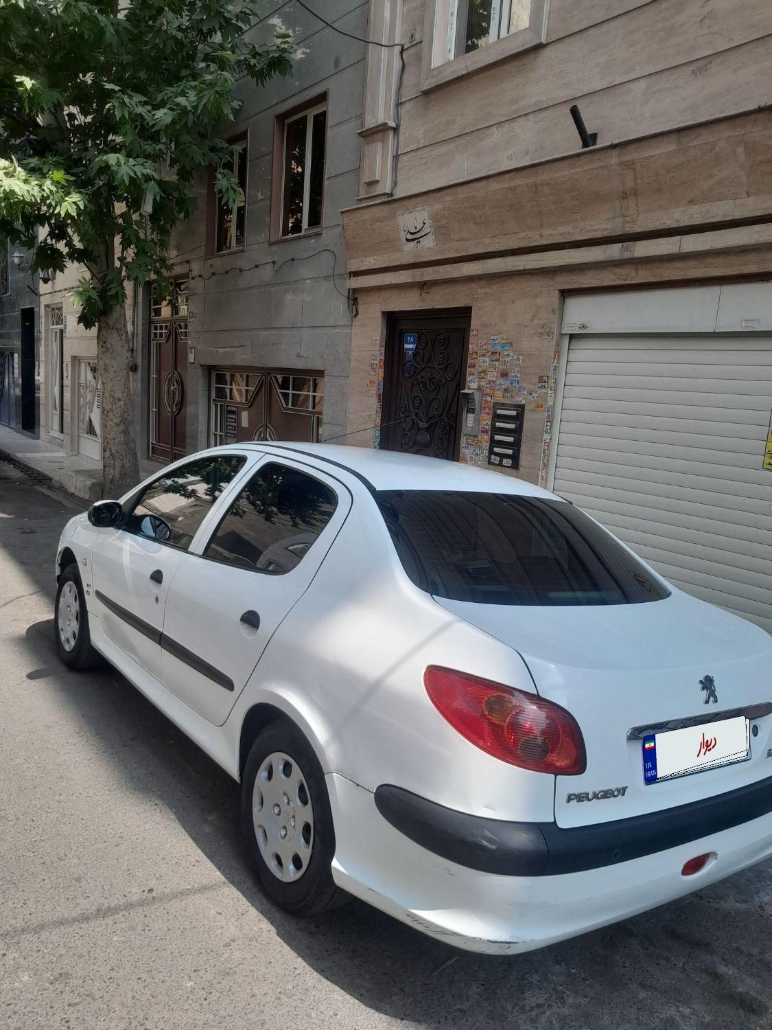 پژو ۲۰۶ صندوق دار v8 - 1395