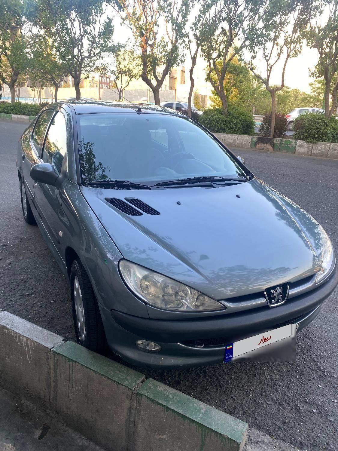 پژو ۲۰۶ صندوق دار v8 - 1396