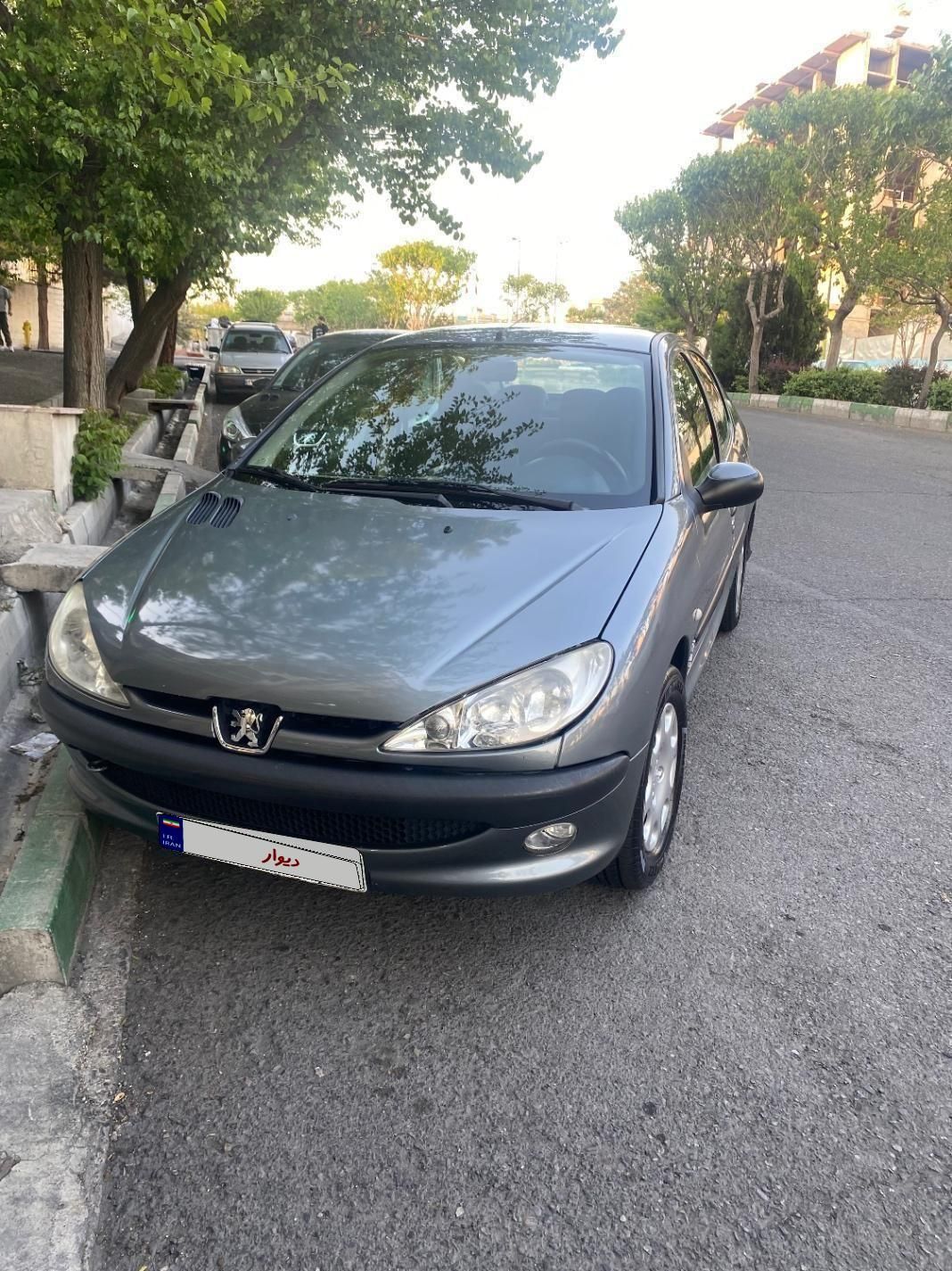پژو ۲۰۶ صندوق دار v8 - 1396