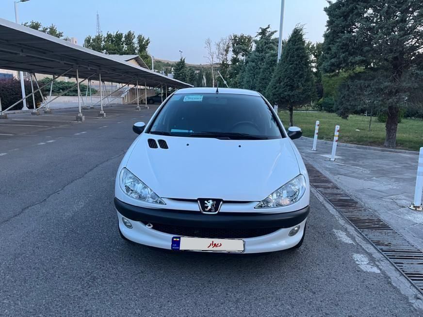 پژو ۲۰۶ صندوق دار v8 - 1399