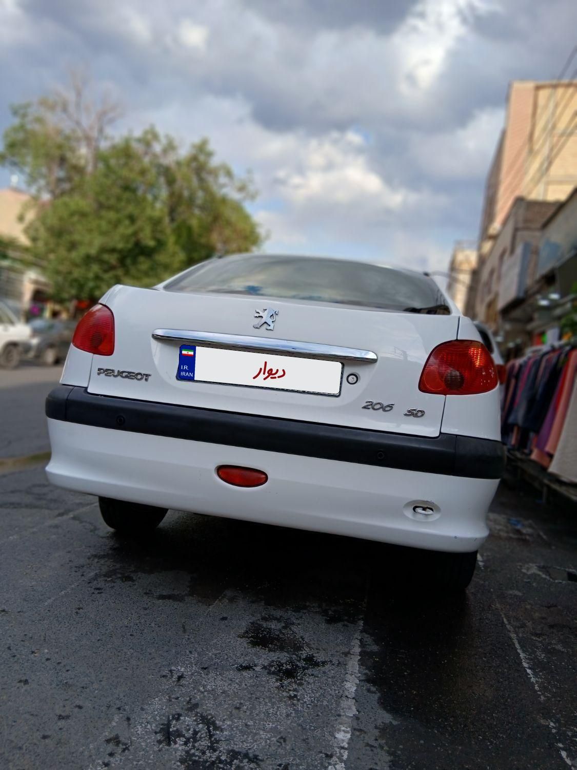 پژو ۲۰۶ صندوق دار v8 - 1395