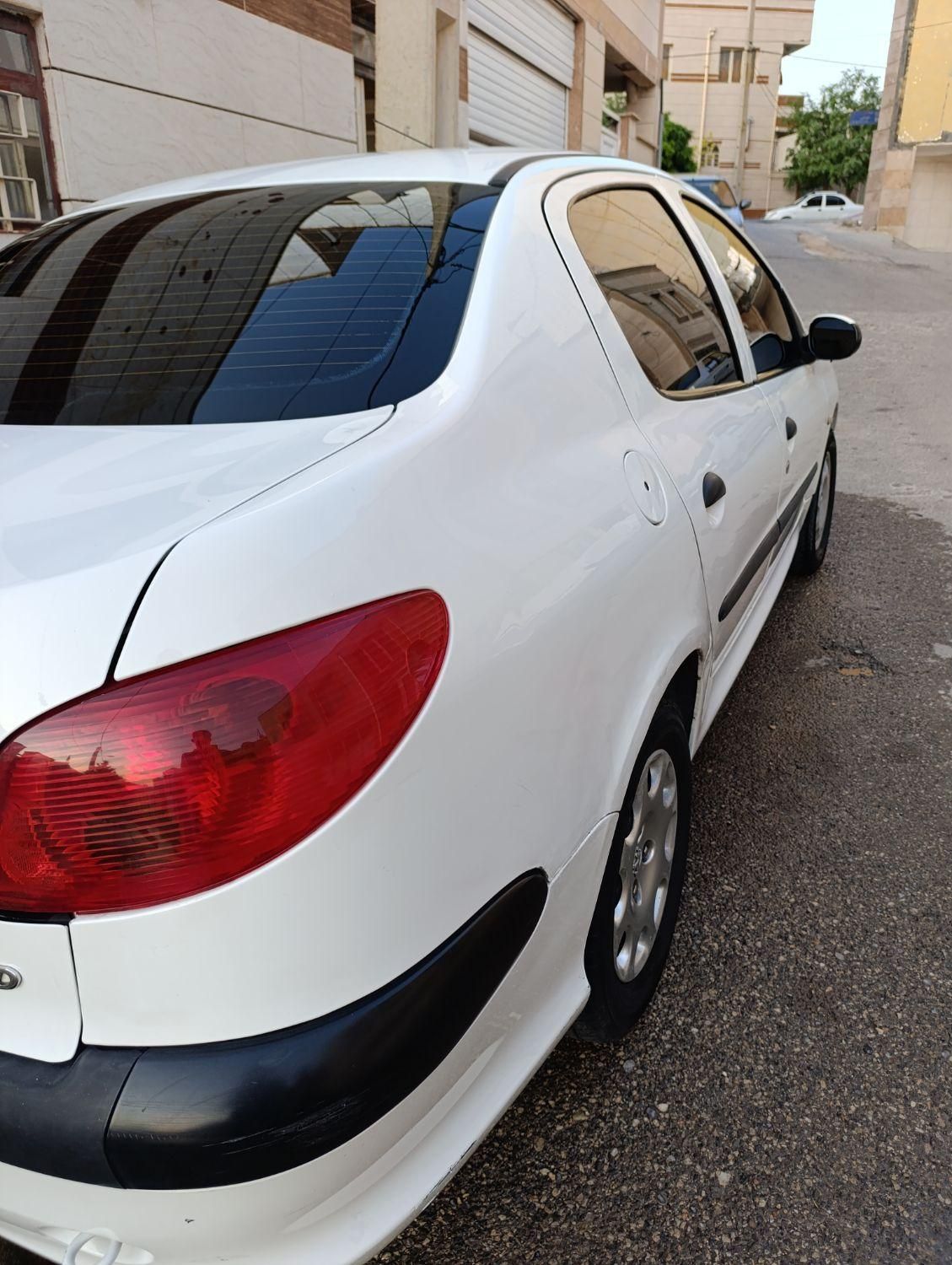 پژو ۲۰۶ صندوق دار v8 - 1396