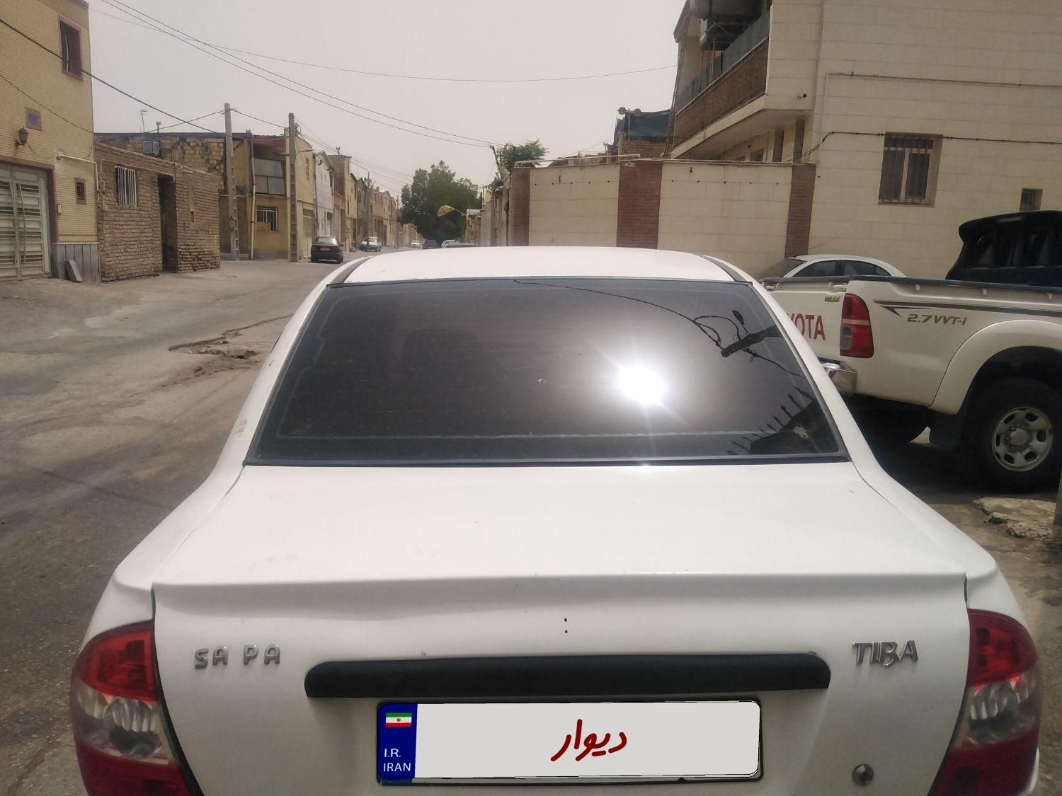 تیبا صندوق دار LX - 1390