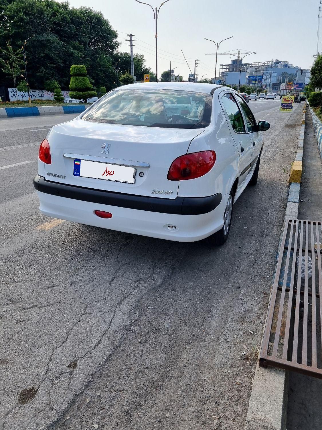 پژو ۲۰۶ صندوق دار v8 - 1397