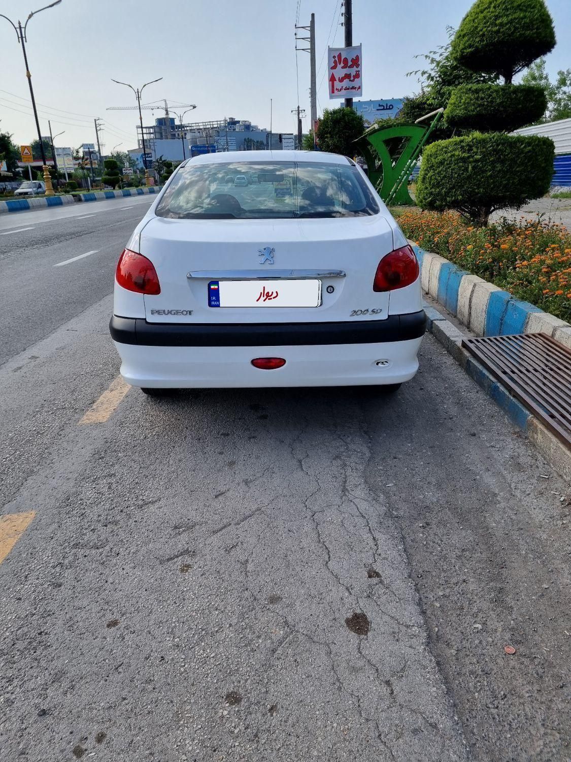 پژو ۲۰۶ صندوق دار v8 - 1397