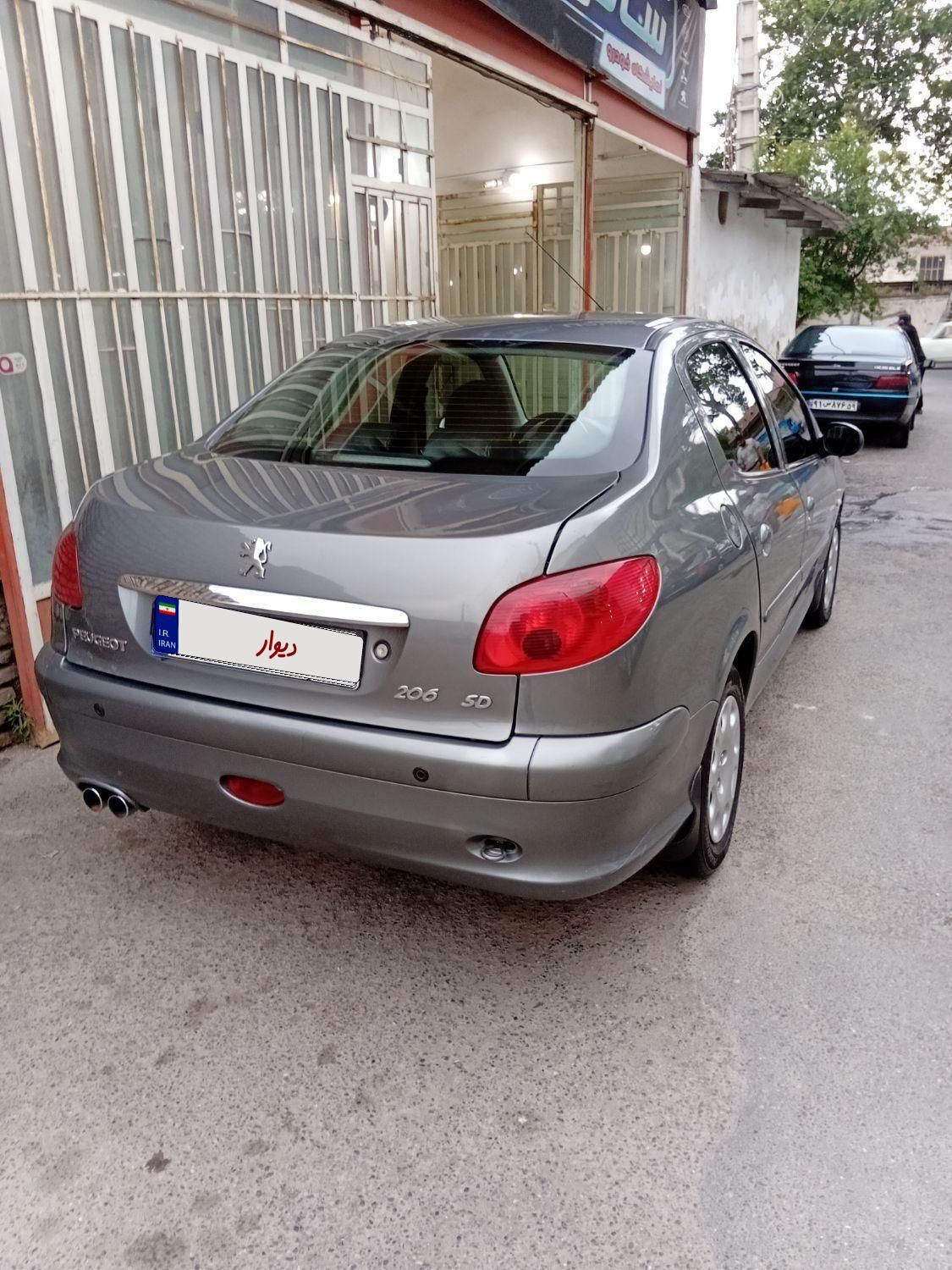 پژو ۲۰۶ صندوق دار v8 - 1394