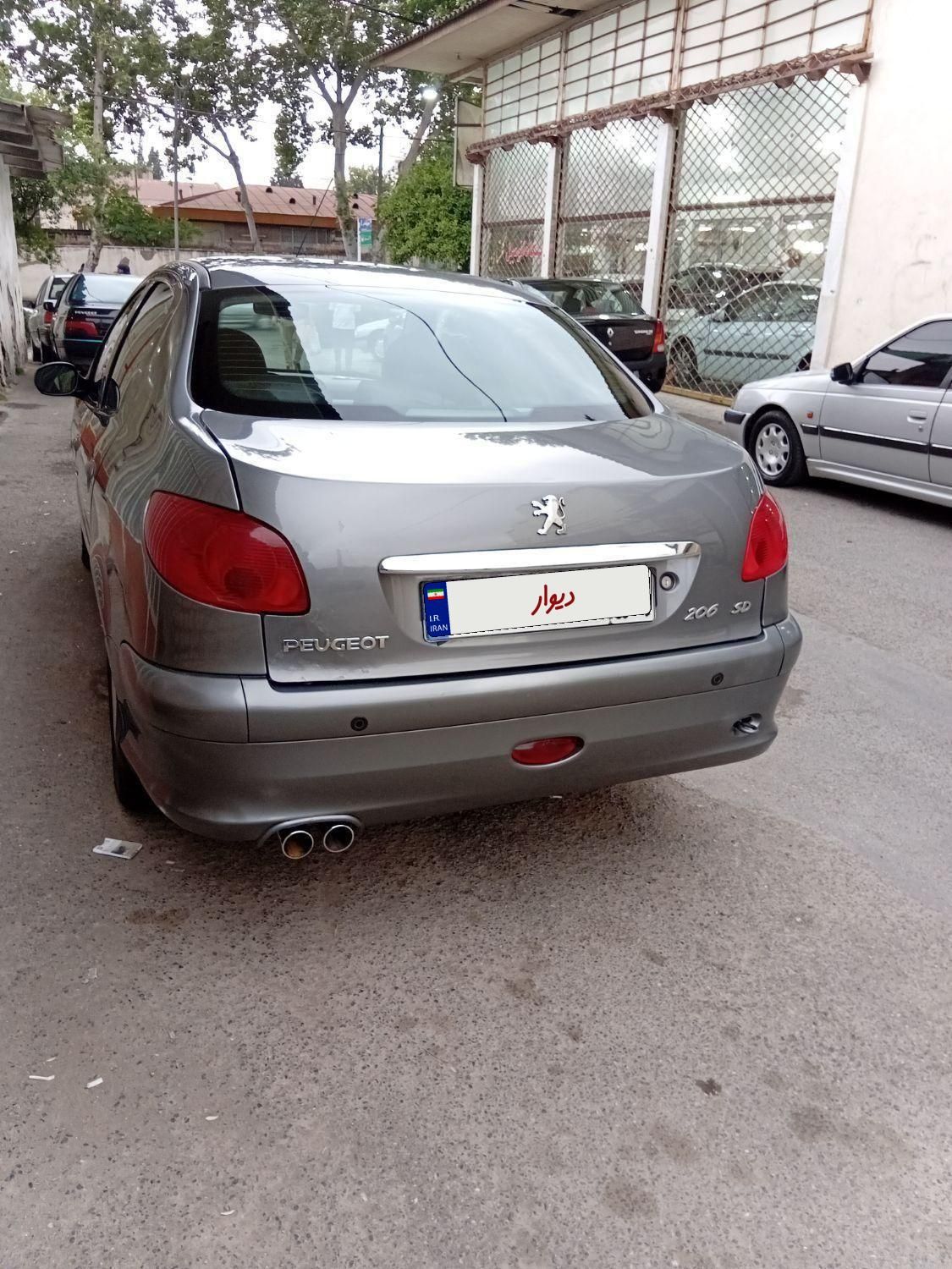 پژو ۲۰۶ صندوق دار v8 - 1394