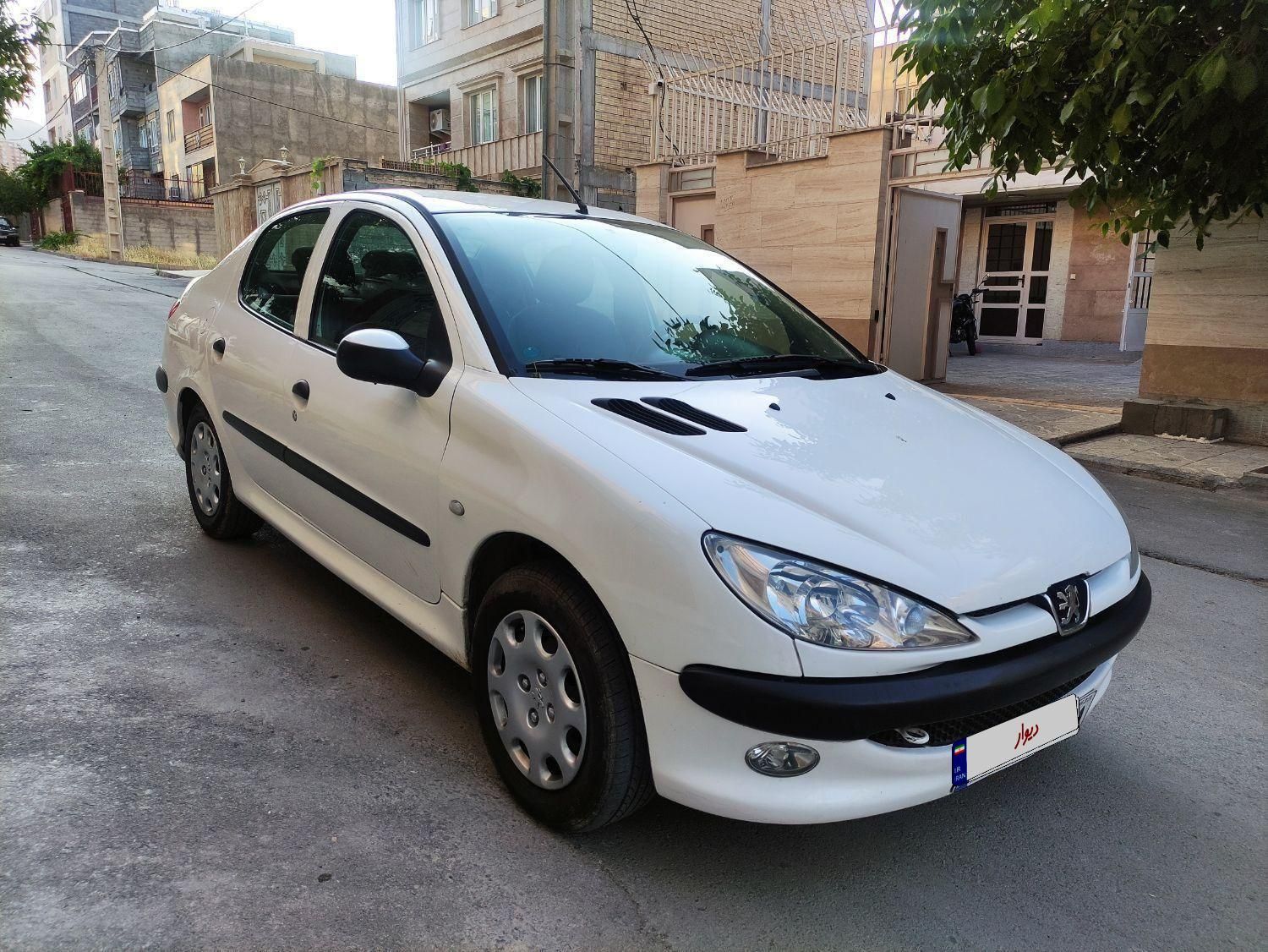 پژو ۲۰۶ صندوق دار v8 - 1394