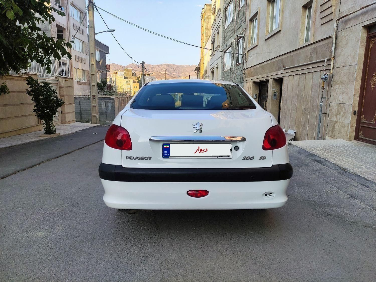 پژو ۲۰۶ صندوق دار v8 - 1394