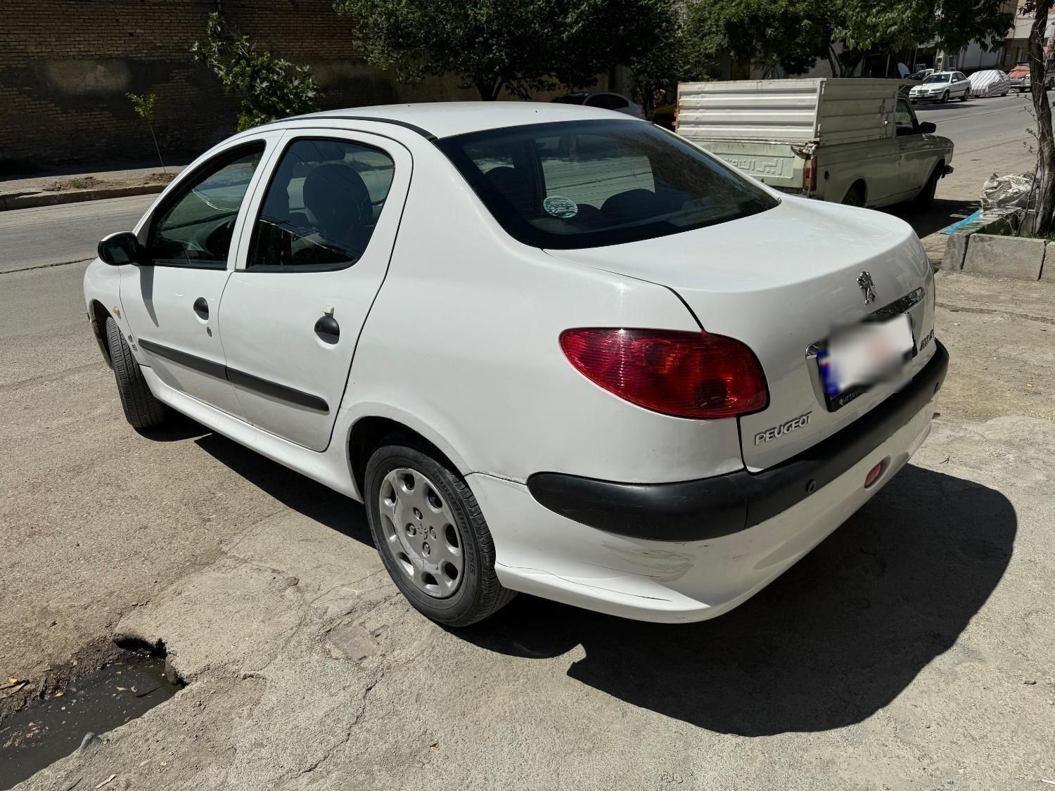 پژو ۲۰۶ صندوق دار v8 - 1397