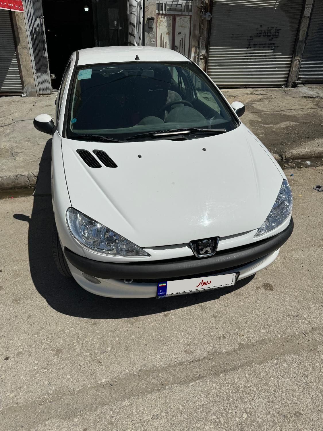 پژو ۲۰۶ صندوق دار v8 - 1397