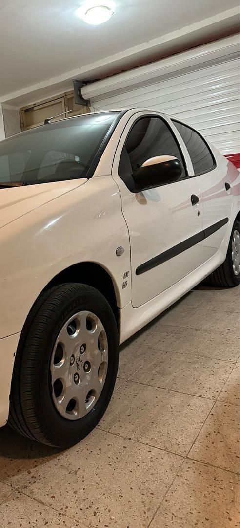 پژو ۲۰۶ صندوق دار v8 - 1398
