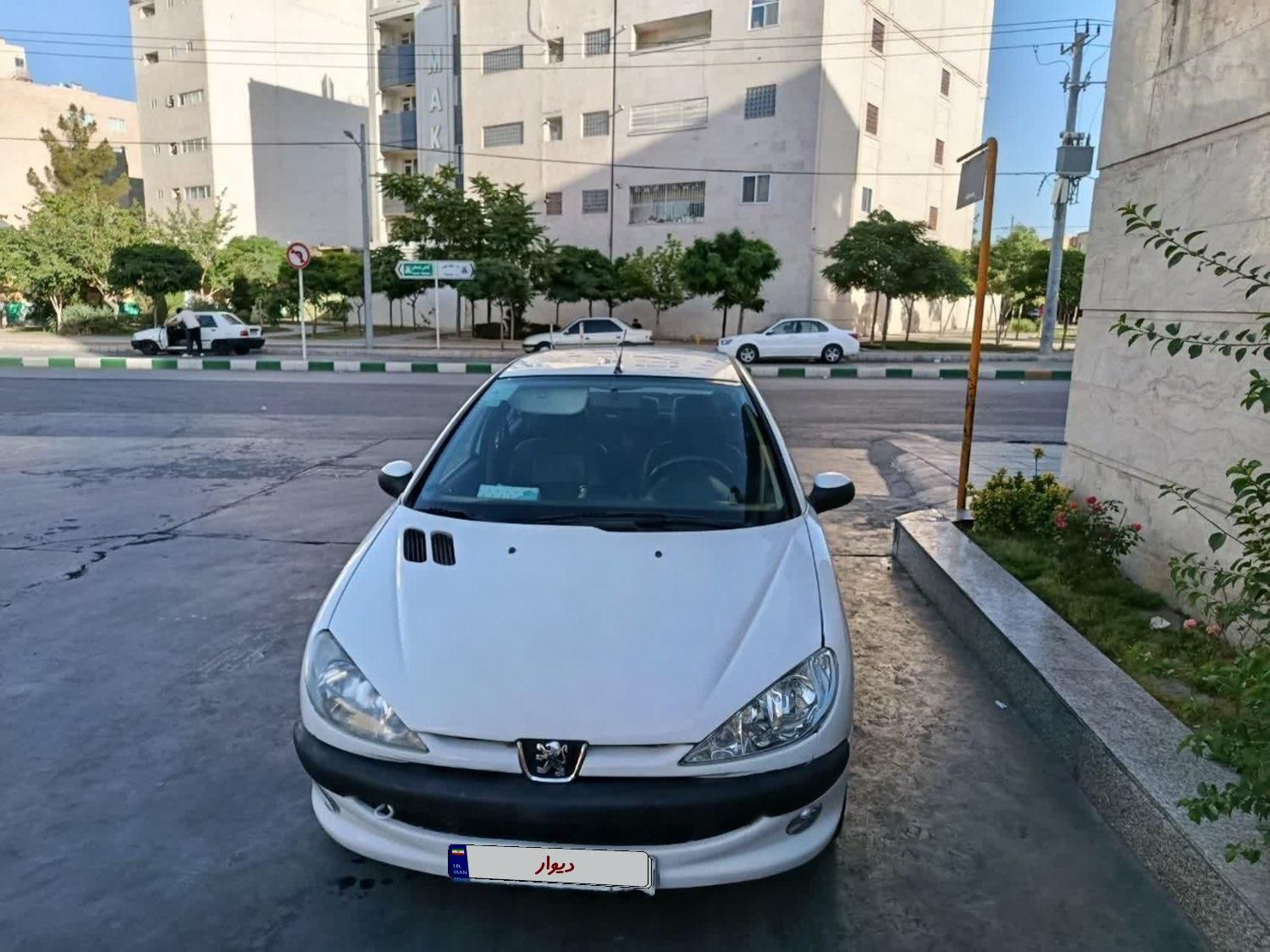 پژو ۲۰۶ صندوق دار v8 - 1394