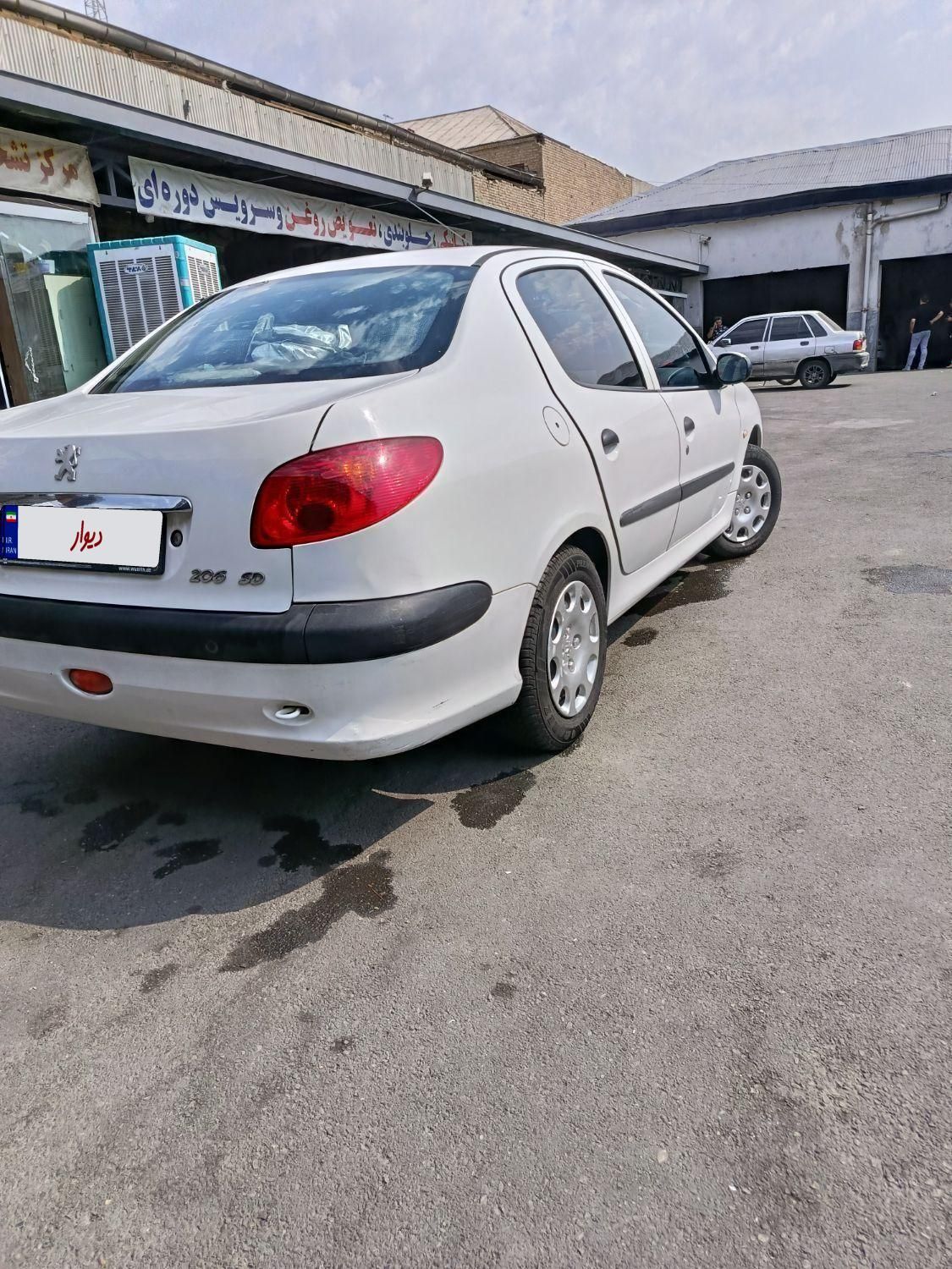 پژو ۲۰۶ صندوق دار v8 - 1396