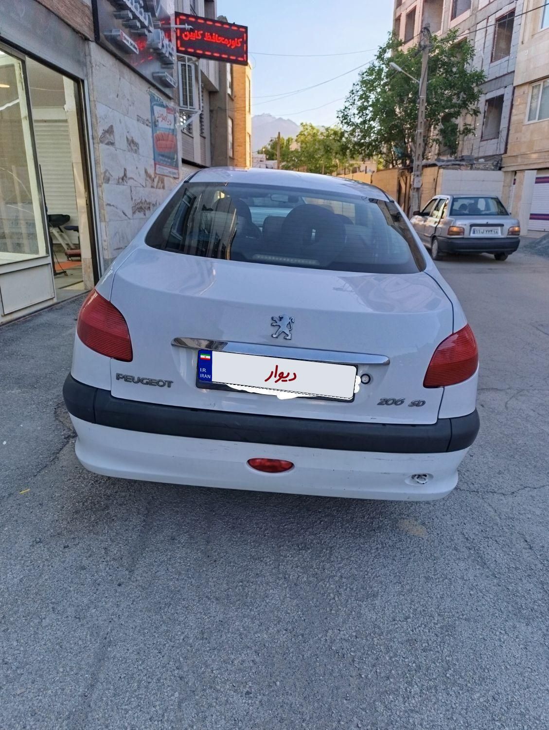پژو ۲۰۶ صندوق دار v9 - 1390