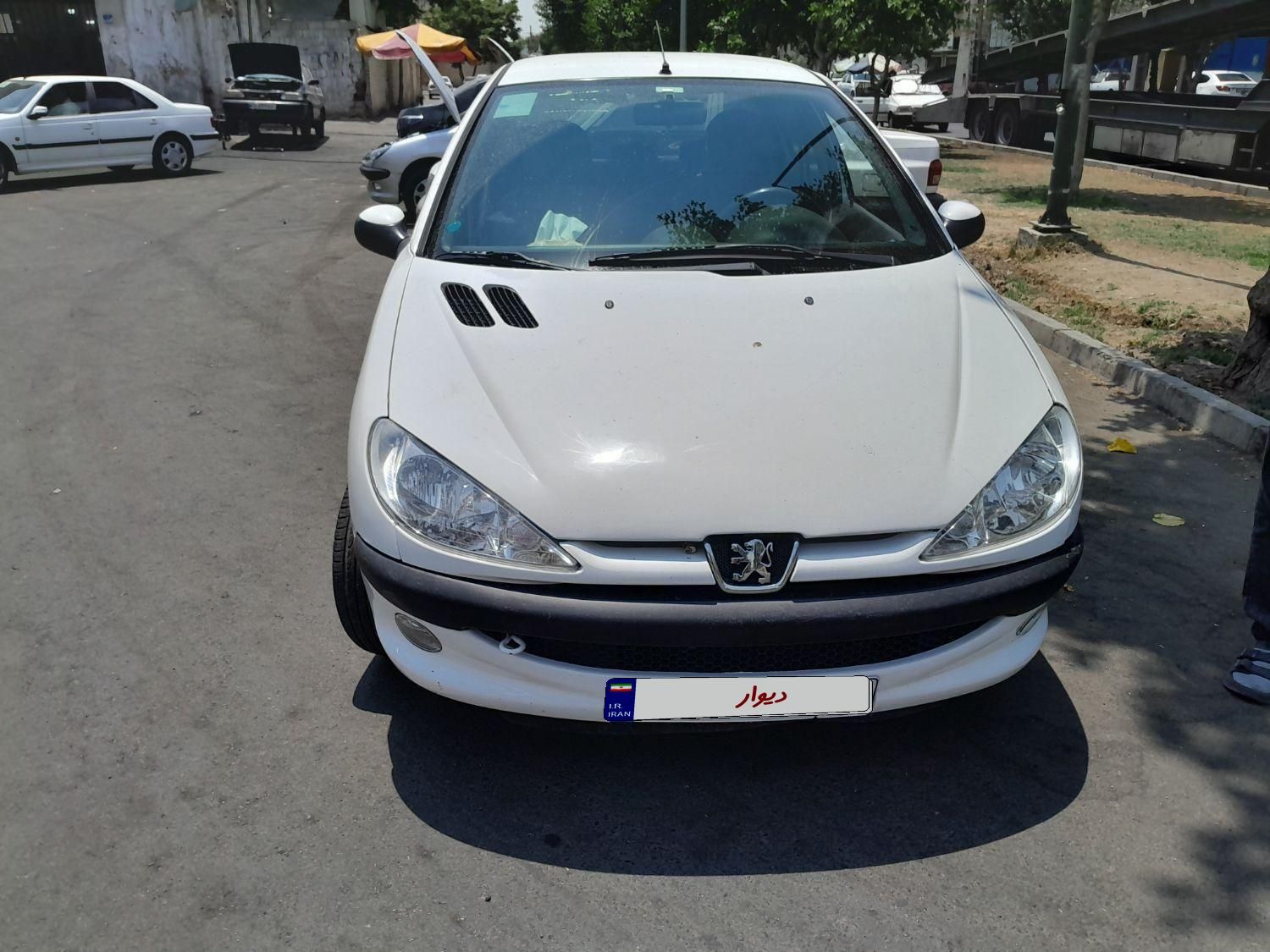 پژو ۲۰۶ صندوق دار v8 - 1397