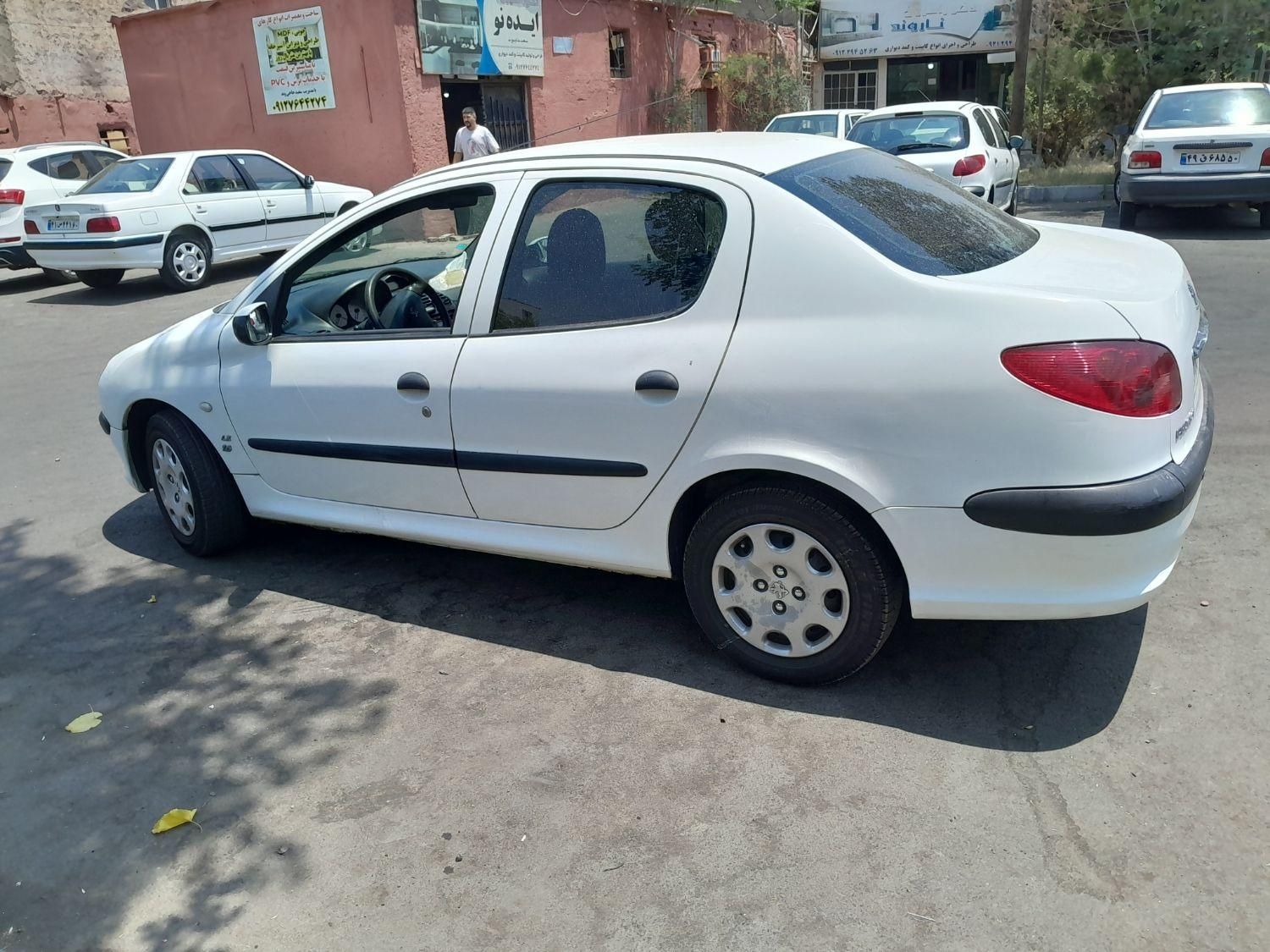 پژو ۲۰۶ صندوق دار v8 - 1397