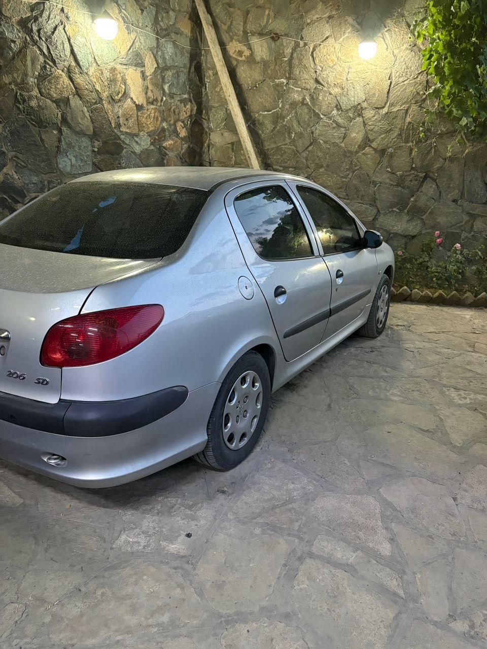 پژو ۲۰۶ صندوق دار v8 - 1396