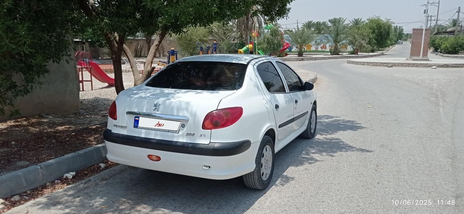 پژو ۲۰۶ صندوق دار v8 - 1394