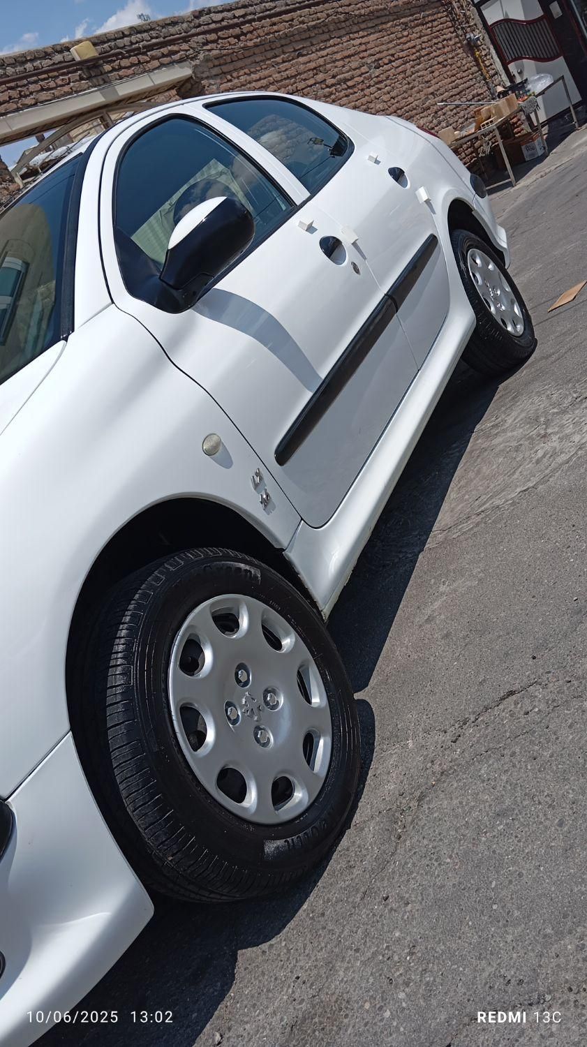 پژو ۲۰۶ صندوق دار v8 - 1396