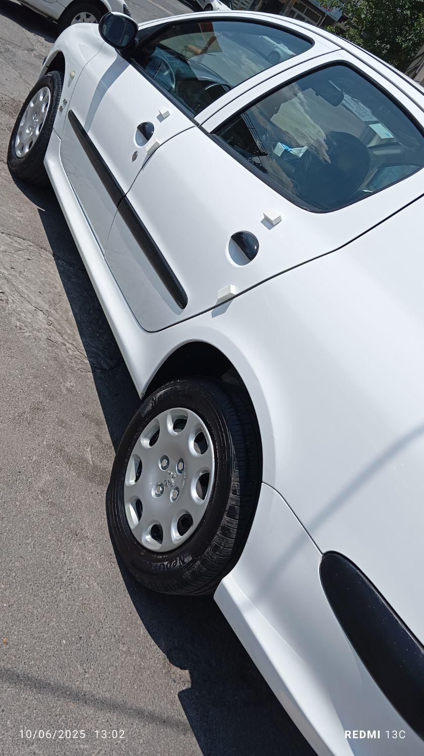 پژو ۲۰۶ صندوق دار v8 - 1396